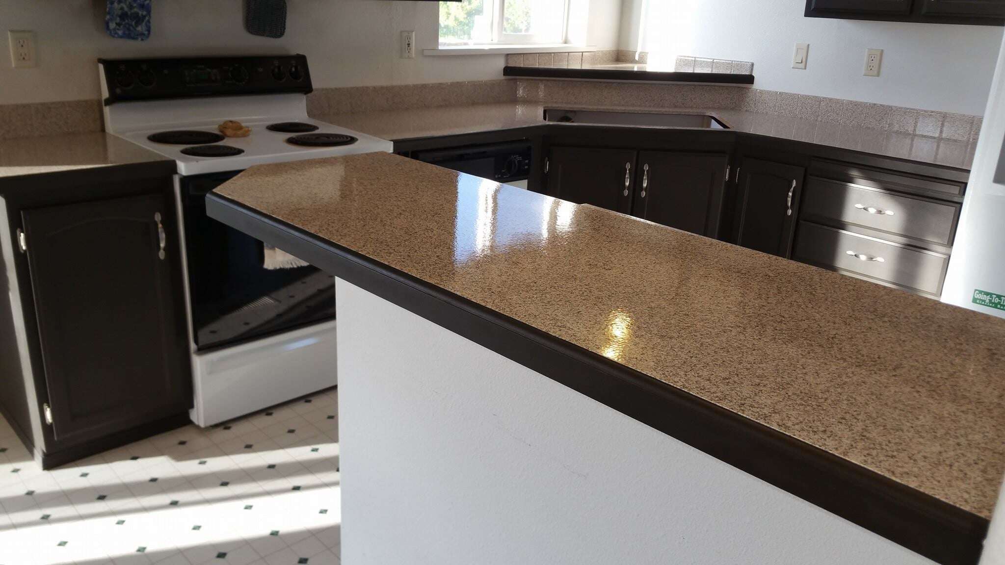 Faux granite edged countertops with detailed stone pattern in Montana