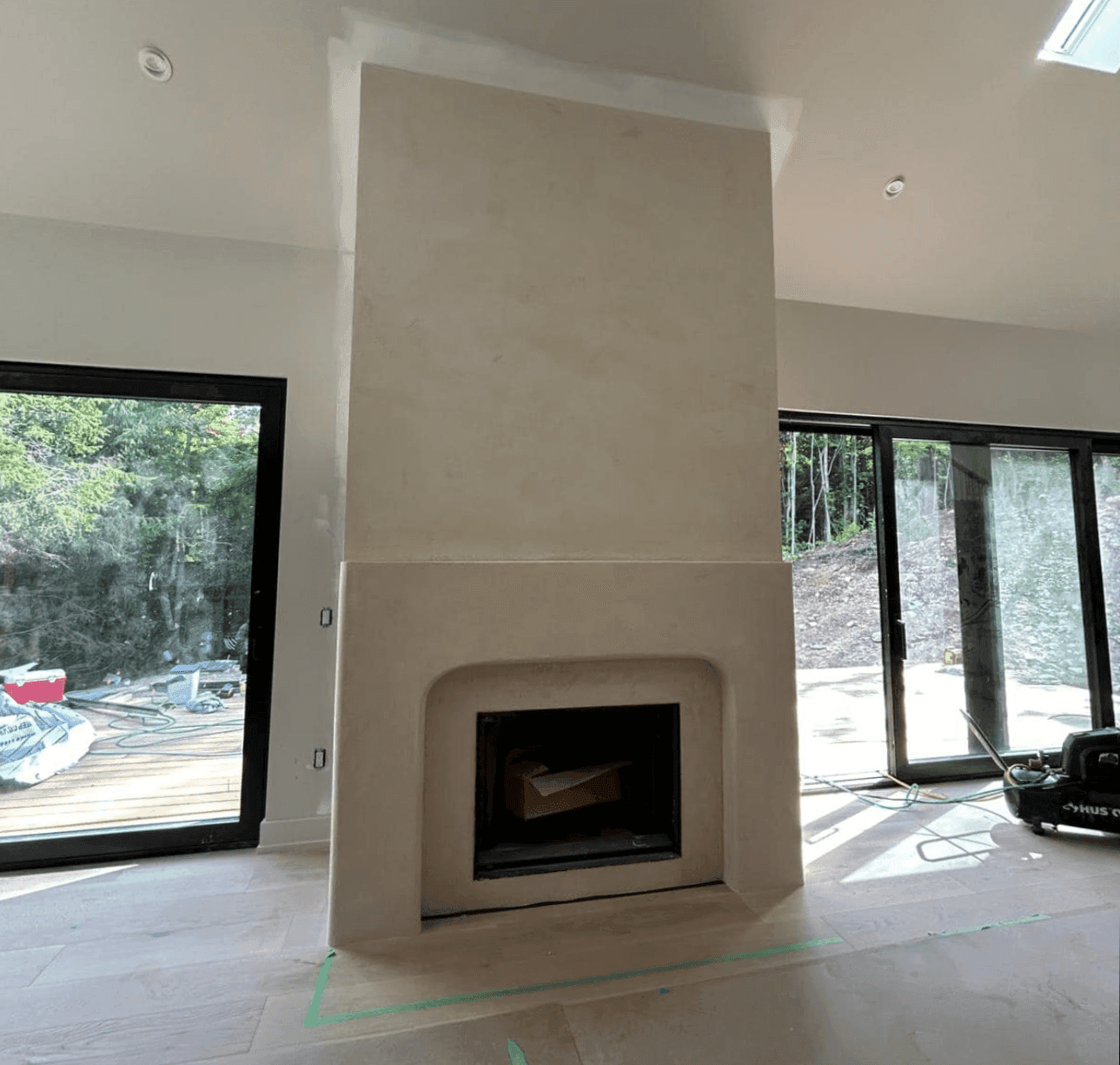 Microcement fireplace surround with seamless modern finish in Montana