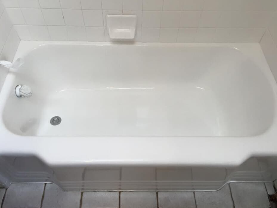 Classic bathtub refinished to smooth porcelain finish by Heritage Coatings