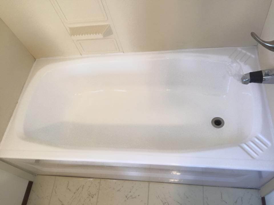 Refinished fiberglass tub restored to smooth bright finish in Montana