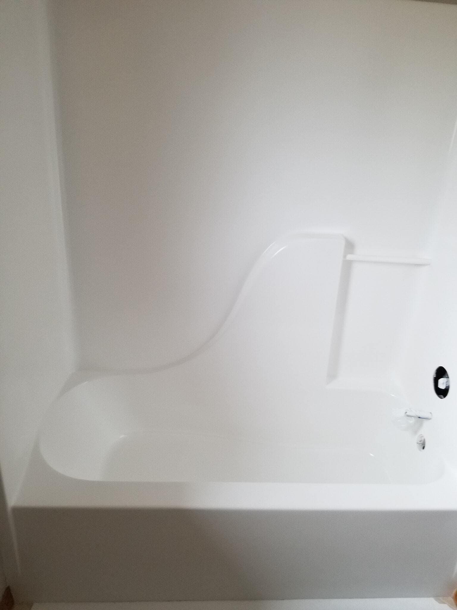 Freshly refinished shower with smooth bright finish in Montana