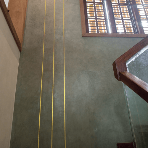 Microcement reveal pattern with textured finish by Heritage Coatings