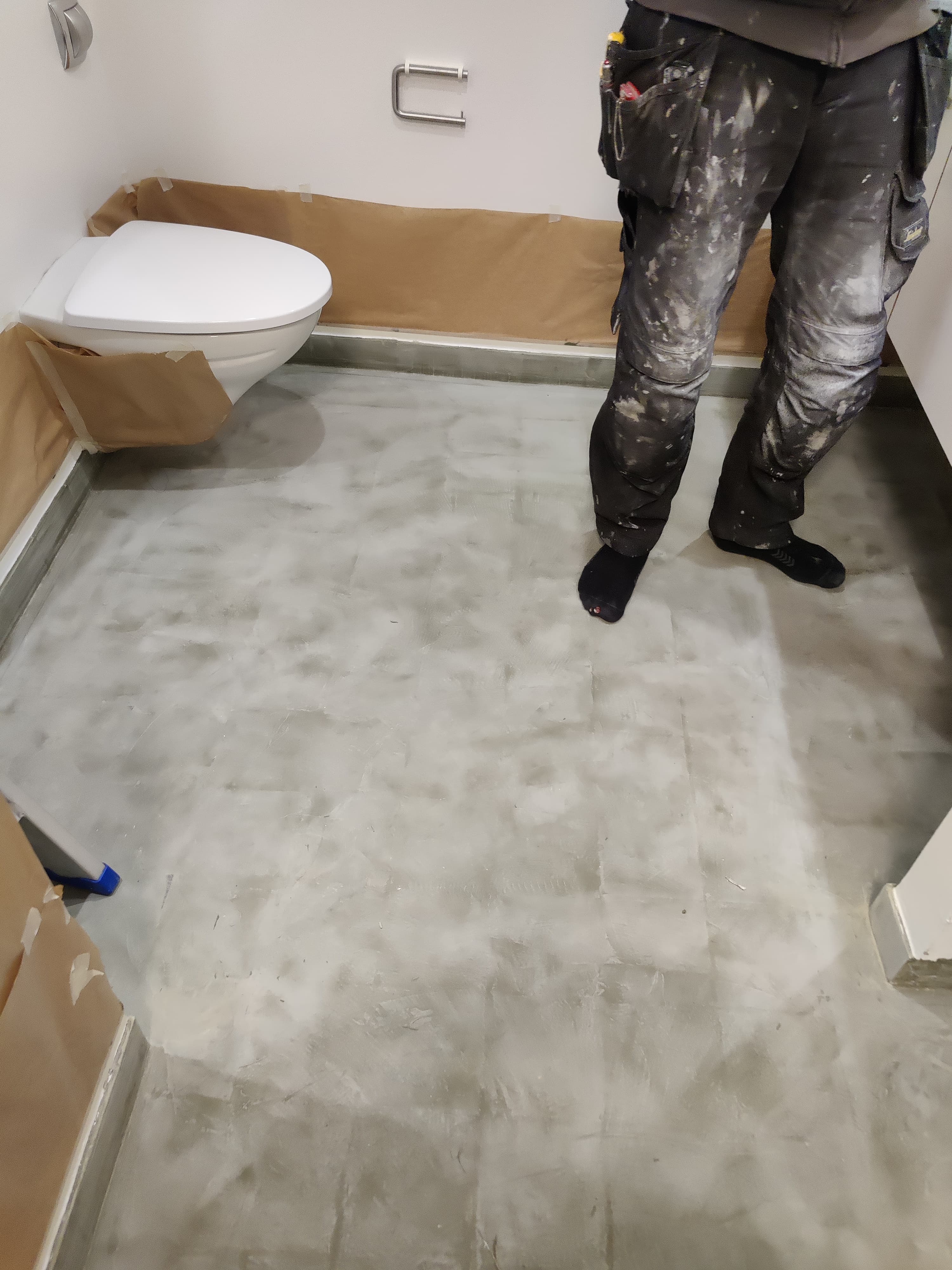 Grey microcement sealed floor with durable finish