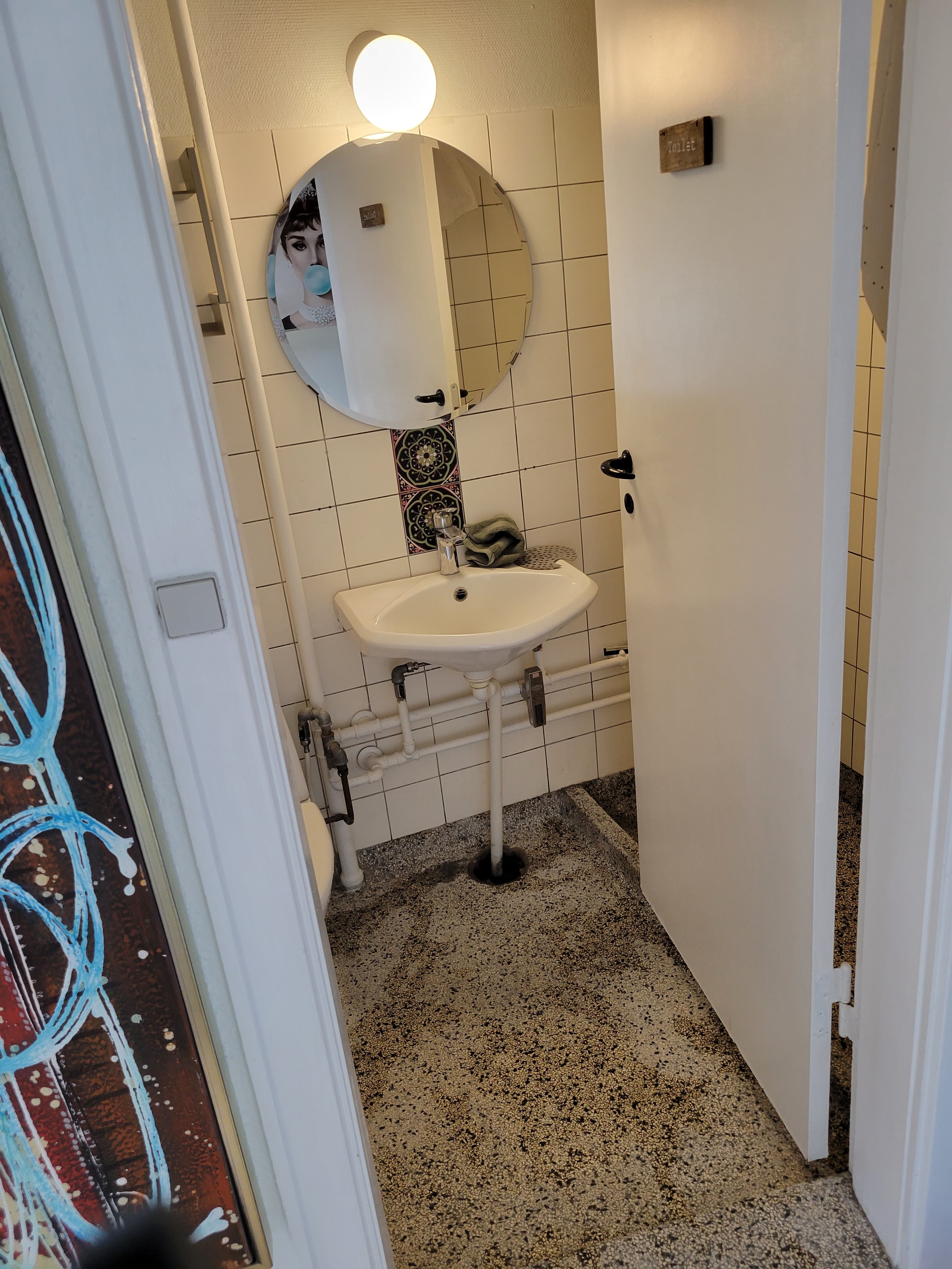 Terrazzo floor before concrete sealing treatment