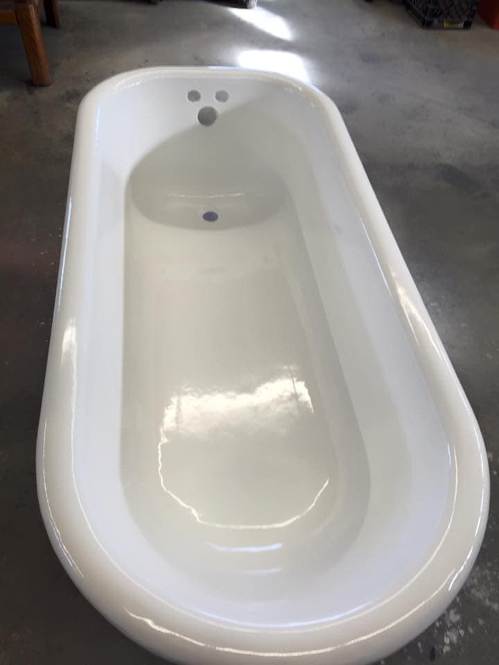 Classic clawfoot tub with black exterior refinish by Heritage Coatings