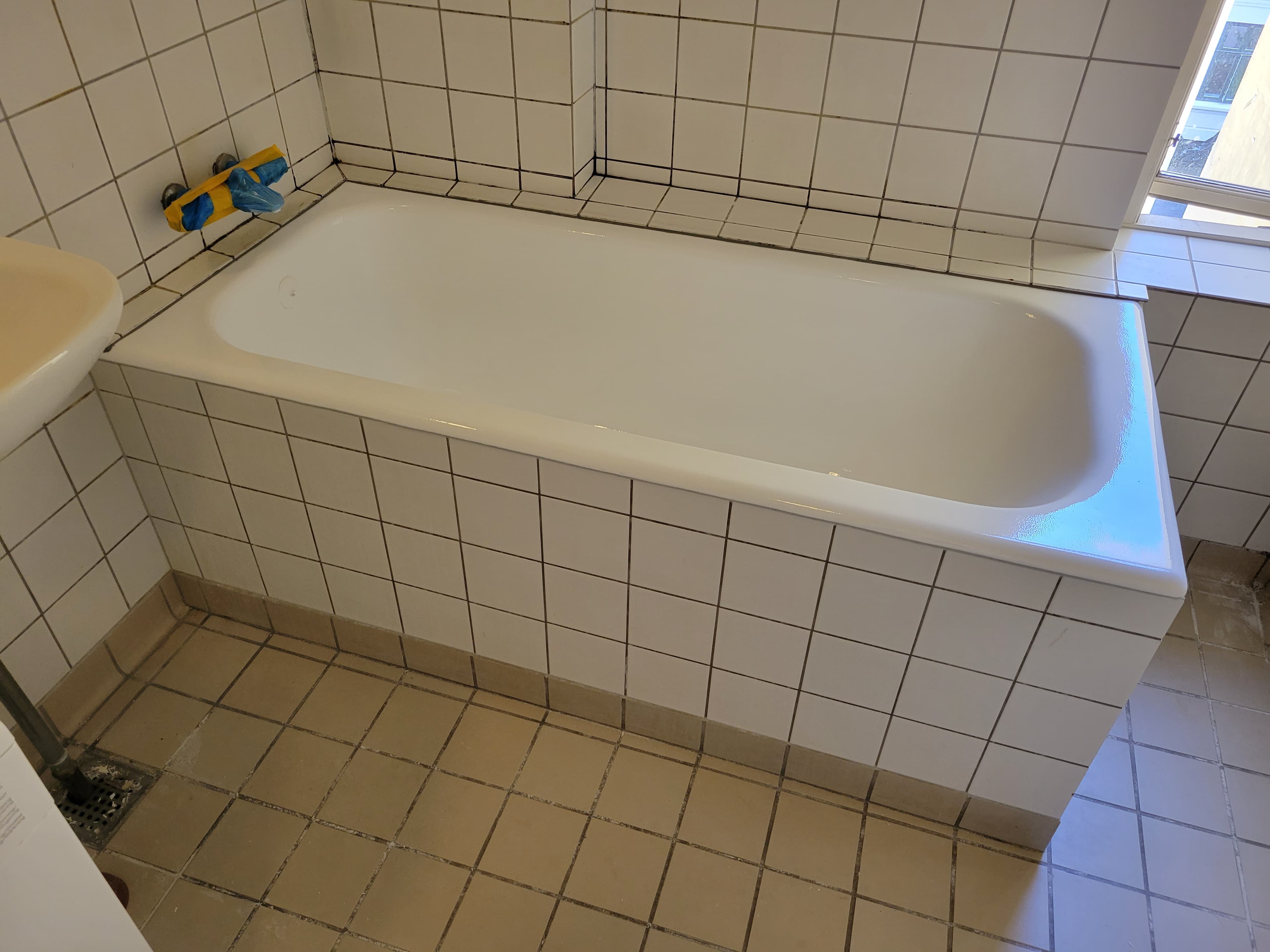 Large-scale bathtub restoration showing commercial refinishing capability