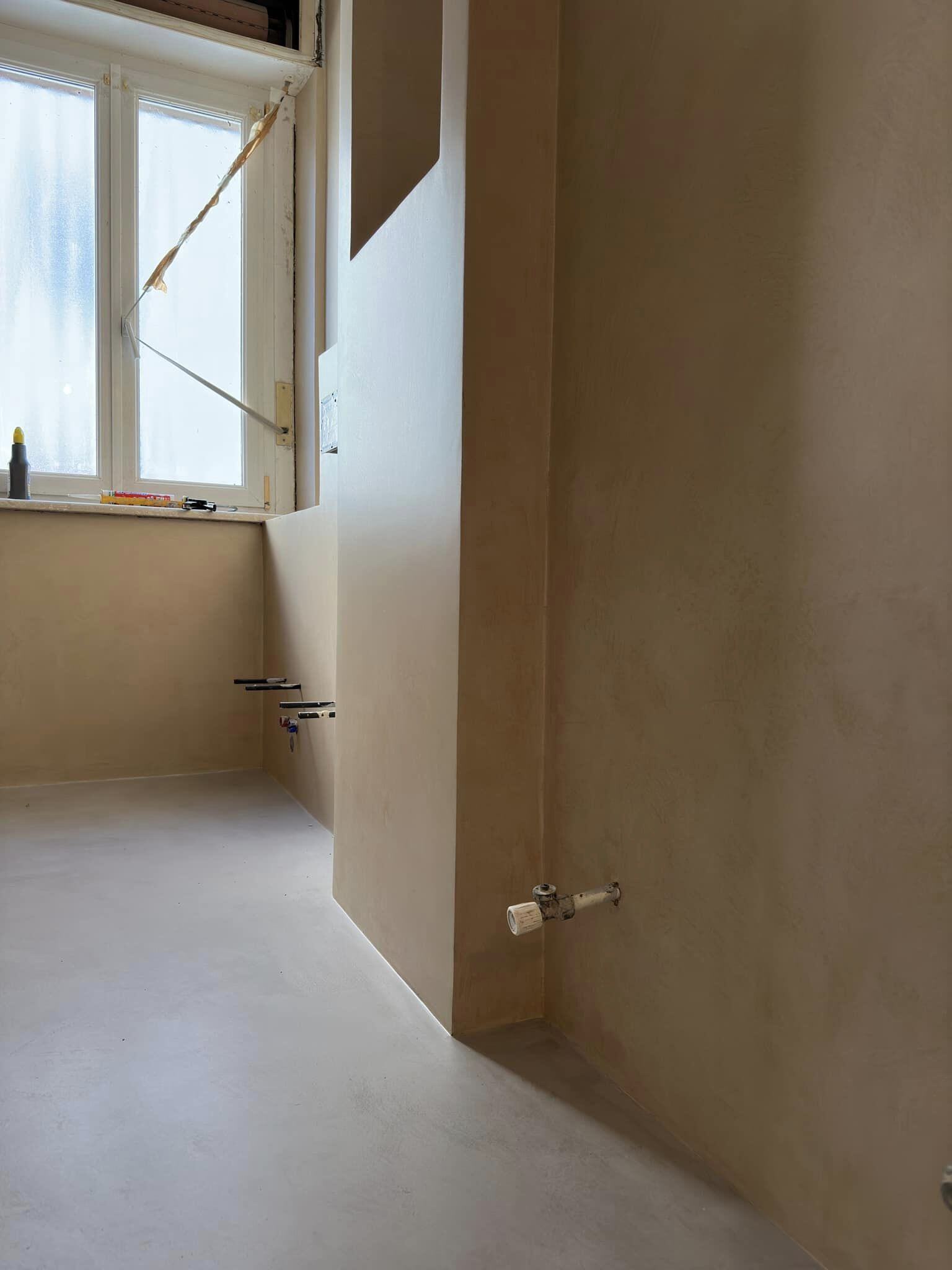 Three-color microcement floor by Heritage Coatings in Bozeman, Montana