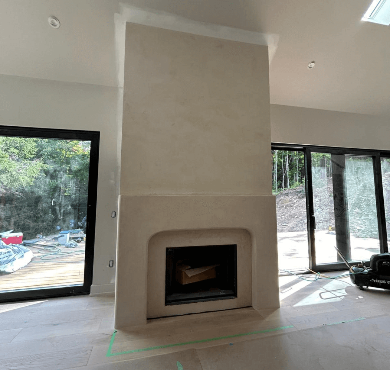 Seamless microcement fireplace surround by Heritage Coatings in Bozeman, Montana