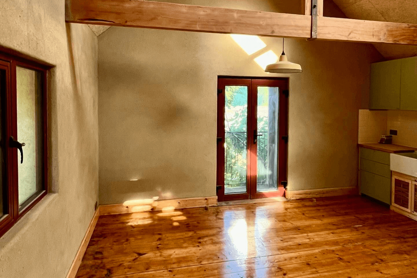 Raw clay plaster studio wall finish by Heritage Coatings in Bozeman, Montana